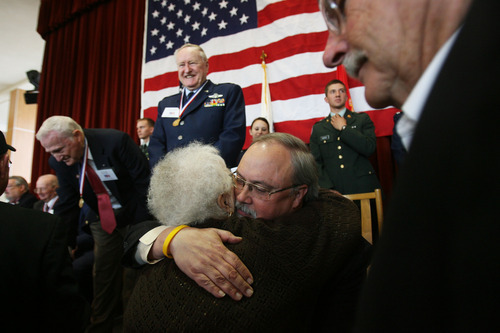 Kim Raff  |  The Salt Lake Tribune
Scott Konopasek, who served in Desert Storm, hugs his mother, Marilyn Konopasek, after receiving a medallion during the Veterans Day celebration at the University of Utah in Salt Lake City on Friday.