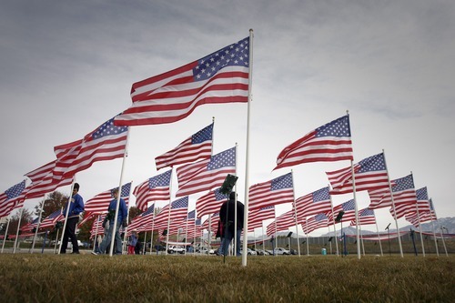 Rick Egan  | The Salt Lake Tribune 
Flags wave in the Field of Honor in front of the Taylorsville City Hall on Friday, representing fallen service members.