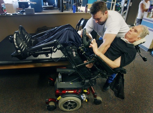 Steve Griffin  |  The Salt Lake Tribune


Mike Erickson, a massage therapist and physical therapist aide, helps Brooke Hopkins, who was paralyzed from a bicycle accident three years ago, into his electric chair during therapy at Neuroworx in South Jordan, Utah Friday, November 11, 2011.