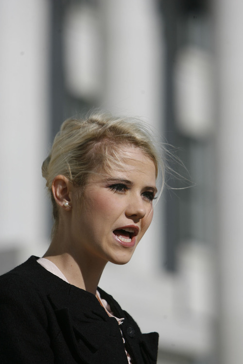 Francisco Kjolseth  |  The Salt Lake Tribune
Elizabeth Smart responds to President Obama's weekend comments regarding the sex abuse scandal at Penn State University and the need to make 