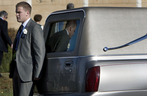 Steve Griffin  |  The Salt Lake Tribune


Scott Strong rests against the hearse carrying the casket of his twin brother, Trevor Strong, after funeral services at an LDS Stake Center in Kearns on Monday, Nov. 14, 2011. Trevor Strong was an LDS missionary who died after being struck by a car while serving his mission in Texas.