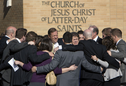 Steve Griffin  |  The Salt Lake Tribune

Family and friends of Trevor Strong, an LDS missionary who died after being struck by a car while serving his mission in Texas, embrace outside the LDS Stake Center in Kearns on Monday, Nov. 14, 2011.