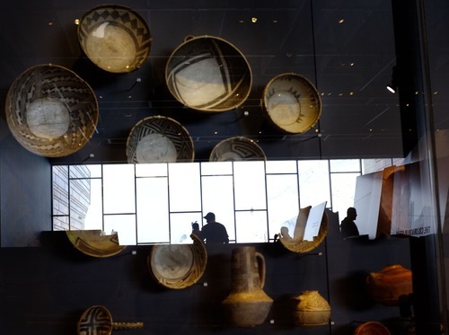 Steve Griffin  |  The Salt Lake Tribune


People are reflected onto a display case of pots in the new Natural History Museum of Utah in Salt Lake City, Utah Saturday, November 5, 2011.