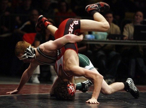 Trent Nelson  |  The Salt Lake Tribune
Beau Blackham of Uintah is on his head facing Mitch Brown of Payson in the 119lb championship match of the 4A State Wrestling Championships at Utah Valley University in Orem, Utah, Thursday, February 10, 2011. Brown won the match.