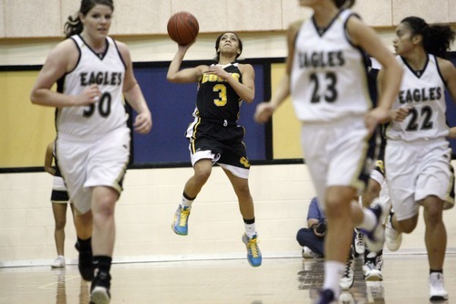 Chris Detrick  |  The Salt Lake Tribune 
Cottonwood's Tina Hosea, ,3 shoots the ball during the game at Skyline High School.