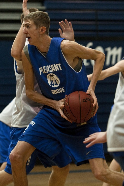 Chris Detrick  |  The Salt Lake Tribune
Pleasant Grove's 7-foot senior center Alan Hamson goes to the basket during a practice Wednesday November 16, 2011.