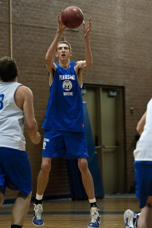 Chris Detrick  |  The Salt Lake Tribune
Pleasant Grove's 7-foot senior center Alan Hamson gets a pass during a practice Wednesday November 16, 2011.