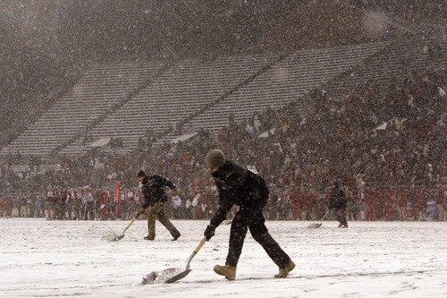 Chris Detrick  |  The Salt Lake Tribune
Workers shovel snow off of the field during the second half of the game at Martin Stadium at Washington State University Saturday November 19, 2011. Utah defeated Washington State 30-27 in overtime.