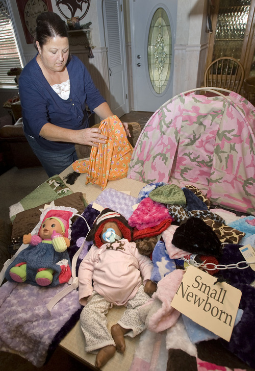 Al Hartmann | The Salt Lake Tribune
Laura Thackeray, owner of Country Classics, started her home-based business more than 30 years ago. She sews everything from hats to quilts to doll tents and sells them at craft fairs.