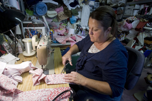 Al Hartmann | The Salt Lake Tribune
Laura Thackeray, owner of Country Classics, started her home-based business more than 30 years ago. She sews everything from hats to quilts to doll tents and sells them at craft fairs.