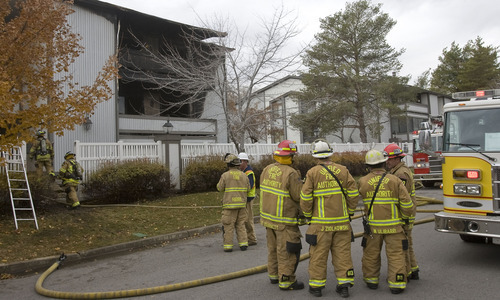 Al Hartmann  |  The Salt Lake Tribune
Unified Fire Authority responded to a fire Thursday morning that destroyed two condos at 6883 S. 760 East in Midvale.