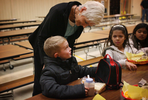 Kim Raff | The Salt Lake Tribune
Gloria Kidd visits with her grandson, Gabe Kidd, during his lunch at Hillside Elementary School in West Valley City on Tuesday. A new BYU study shows that kids who have good relationships with grandparents are more engaged in school and have better social behaviors. Kidd works in the office at the school and gets to see two of her grandkids who are students at the school.