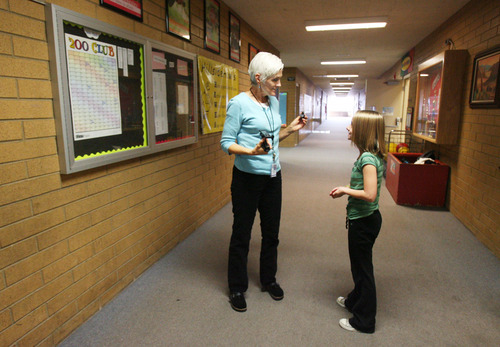 Kim Raff | The Salt Lake Tribune
Gloria Kidd visits with granddaughter Maddy Leavitt at Hillside Elementary School in West Valley City. A new BYU study shows that kids who have good relationships with grandparents are more engaged in school and have better social behaviors. Kidd works in the office at the school and gets to see two of her grandkids who attend Hillside.