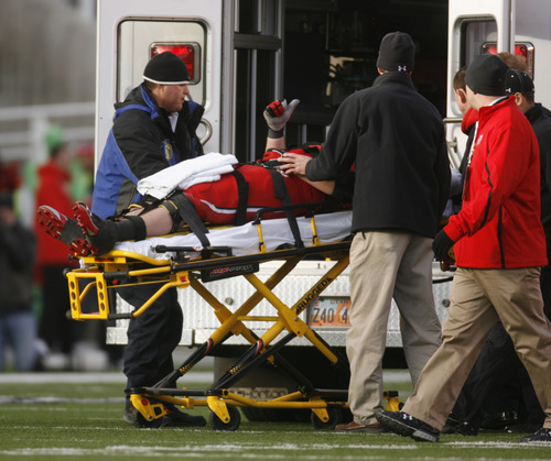 Trent Nelson  |  The Salt Lake Tribune
Utah's Sam Brenner gives a thumbs up to the crowd as he is put into an ambulance in the second half, Utah vs. Colorado football game at Rice-Eccles Stadium in Salt Lake City on Friday, Nov. 25, 2011