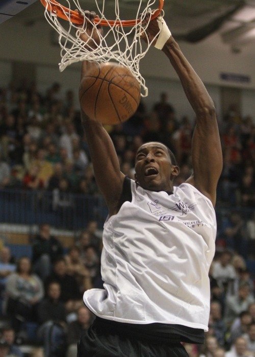 Rick Egan  | The Salt Lake Tribune 

Jeremy Evans dunks the ball for the Stars,  in the NBA lockout charity exhibition game at Lifetime Activities Center at Salt Lake Community College, Monday, November 7, 2011.