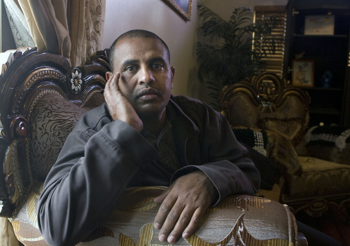Al Hartmann  |  The Salt Lake Tribune
Almoh Bahaji ponders the death of his nephew, Omar Sharif, who was allegedly murdered at the Utah State Hospital for the mentally ill last spring. After eight months, the family has felt ignored because no information about the case has been provided to them.