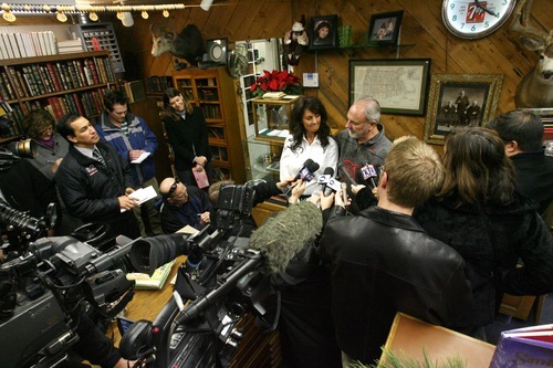 Steve Griffin  |  The Salt Lake Tribune

Heidi Miller and her father, Earl Black, talk with the media from B&W Billiards and Books store in Salt Lake City on Monday, Nov. 28, 2011 on the anniversary of Sherry Black's murder in the bookstore. Sherry was Heidi's mother and Earl's wife. The father and daughter will host a memorial service in memory of Sherry on Wednesday, Nov. 30, 2011, at Wasatch Lawn Memorial Park and Mortuary in Salt Lake City.
