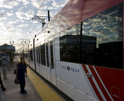 Al Hartmann  |  Tribune file photo
A passenger waits to catch an early morning TRAX train. The last time the Utah Transit Authority had a 