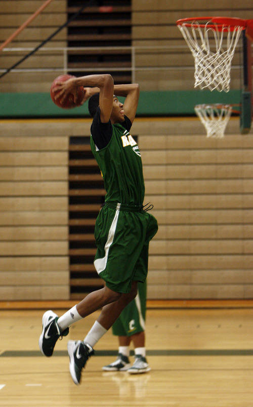 Francisco Kjolseth  |  The Salt Lake Tribune
Kearns basketball player Dayon Goodman works out with the team during a recent practice at Kearns High School on Tuesday, November 29, 2011.