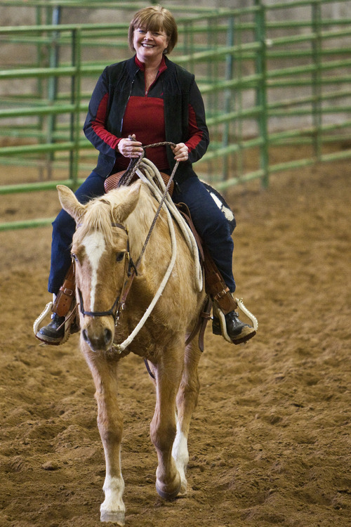 Chris Detrick |  Tribune file photo
LaNae Orbin rides her horse, Reno, at the Salt Lake County Equestrian Center. A new master plan identifies $24 million in improvements that, over time, could make the South Jordan facility a major attraction for horse aficionados.