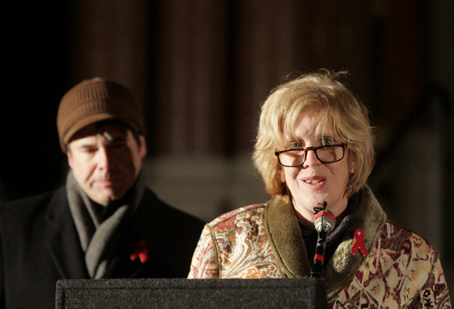 Trent Nelson  |  The Salt Lake Tribune
Salt Lake City Council Chair Jill Remington-Love, right, and Councilman Luke Garrott read a proclamation at a gathering marking World Aids Day at the City & County Building in Salt Lake City, Utah, Thursday, December 1, 2011.