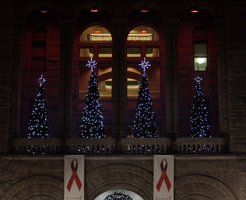 Trent Nelson  |  The Salt Lake Tribune
Red ribbons and red lights marking World Aids Day at the City & County Building in Salt Lake City, Utah, Thursday, December 1, 2011.