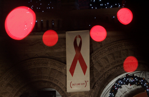 Trent Nelson  |  The Salt Lake Tribune
Red ribbons and red lights marking World Aids Day at the City & County Building in Salt Lake City, Utah, Thursday, December 1, 2011.