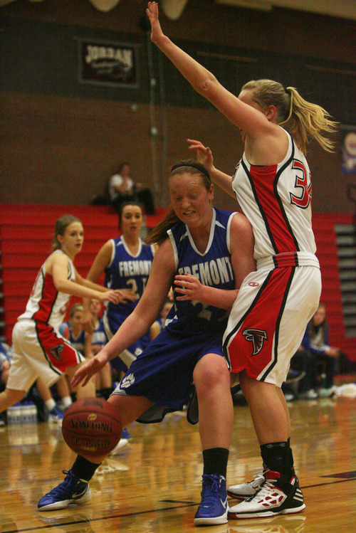 Kim Raff | The Salt Lake Tribune
Alta's (right) player Jessica Butler blocks Fremont player Tanesha Daniels during a girls basketball at Alta High School in East Sandy, Utah on Wednesday, November 30, 2011.   Alta went  on to win the game.