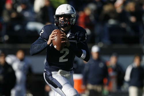 Chris Detrick  |  The Salt Lake Tribune
Utah State Aggies quarterback Adam Kennedy (2) throws the ball during the first half of the game at Romney Stadium Saturday November 26, 2011. Nevada is winning the game 10-7.