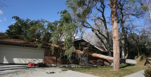 Steve Griffin  |  The Salt Lake Tribune
Wind damage, such as this in Layton, is something typically beyond the control of a property owner, and generally covered by most policies. Insurance is capped only by how much insurance you bought for your house.