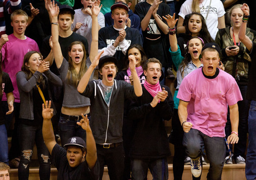 Trent Nelson  |  The Salt Lake Tribune
Highland fans cheer on their team at Highland vs. Riverton High School basketball in Salt Lake City, Utah, Friday, December 2, 2011.