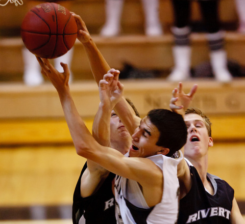 Trent Nelson  |  The Salt Lake Tribune
Highland's Lennon Betonney fights for a rebound at Highland vs. Riverton High School basketball in Salt Lake City, Utah, Friday, December 2, 2011.