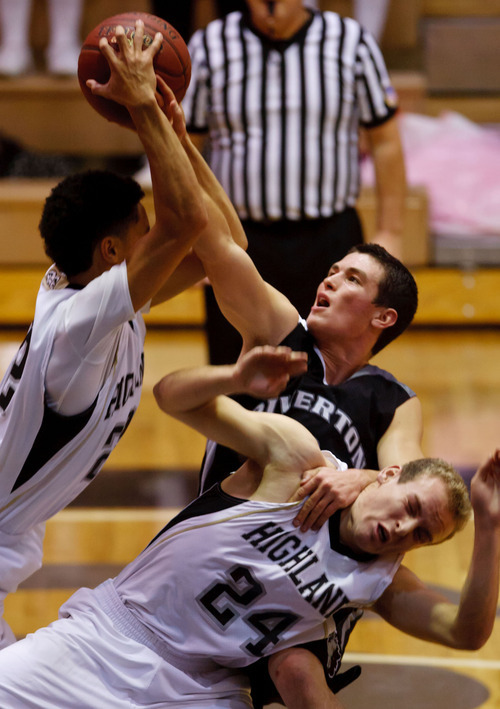 Trent Nelson  |  The Salt Lake Tribune
Highland's Liam Thomas, left, Riverton's Austin Anderson and Highland's Hayes Hicken compete for a rebound at Highland vs. Riverton High School basketball in Salt Lake City, Utah, Friday, December 2, 2011.