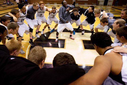 Trent Nelson  |  The Salt Lake Tribune
Highland players huddle before tip off at Highland vs. Riverton High School basketball in Salt Lake City, Utah, Friday, December 2, 2011.