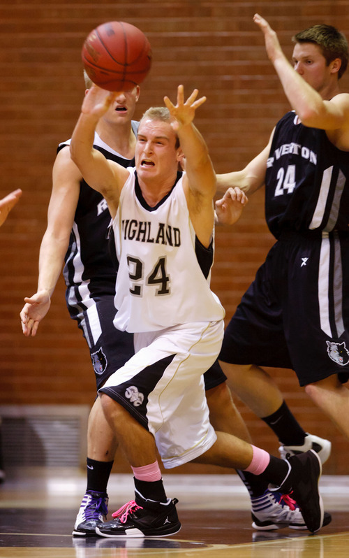 Trent Nelson  |  The Salt Lake Tribune
Highland's Hayes Hicken passes the ball at Highland vs. Riverton High School basketball in Salt Lake City, Utah, Friday, December 2, 2011.