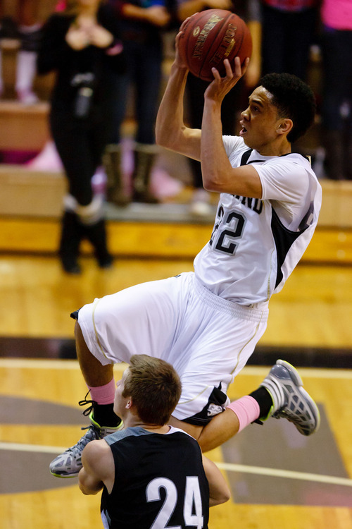 Trent Nelson  |  The Salt Lake Tribune
Highland's Liam Thomas flies to the basket for a layup at Highland vs. Riverton High School basketball in Salt Lake City, Utah, Friday, December 2, 2011.