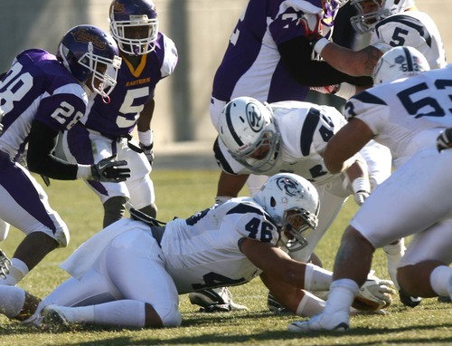 Leah Hogsten | The Salt Lake Tribune  
Snow College's Timote Vamanrav grabs the fumble in the 2nd quarter. 
Snow College leads at the half 22-9 over Eastern Arizona  during the 8th Annual Top of the Mountain Bowl Saturday, December 3 2011