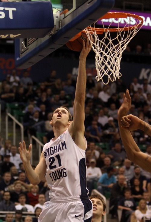 Rick Egan  | The Salt Lake Tribune 

BYU's Stephen Rogers (21) scores for the Cougars, in second half basketball action, BYU vs Oregon, at EnergySolutions Arena, Saturday, December 3, 2011.