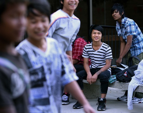 Leah Hogsten | The Salt Lake Tribune
KaPaw Htoo, 16, plays buka ball with his fellow Burmese classmates during lunch. He started the school year as a junior at Cottonwood High after moving to Utah fom a Thai refugee camp with his family. He arrived with no English skills and a limited educational background. In November, KaPaw Htoo's family moved to Heber, and now he attends Wasatch High.