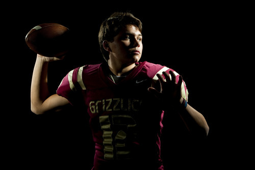 Chris Detrick  |  The Salt Lake Tribune
Logan quarterback D.J. Nelson set a state record with 606 yards of offense in the Grizzlies' semifinal win over Bountiful. He went 14-0 as a quarterback and led the Grizzlies to a 4A championship win.
