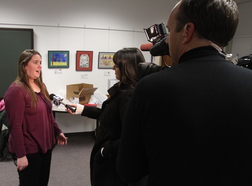 Rick Egan  | The Salt Lake Tribune 

Jennifer Graves talks to the media at the Hunter Library on Monday. Friends and family of missing West Valley City woman Susan Cox Powell gathered donations for the Christmas Box House, at the Hunter Library in West Valley City.