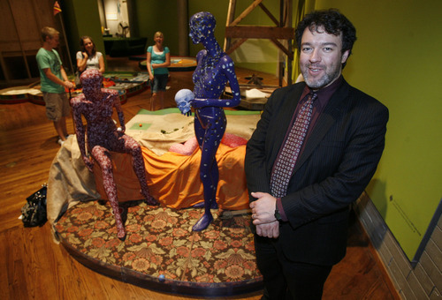 Francisco Kjolseth  |  The Salt Lake Tribune

Adam Price, Executive Director of the Salt Lake Art Center is pictured amongst his latest exhibit called Contemporary Masters which is 18 holes of fully playable miniature golf.