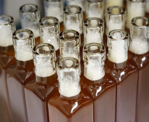 Trent Nelson  |  The Salt Lake Tribune
Bottles are filled with honey vinegar at the Slide Ridge farm in Mendon.