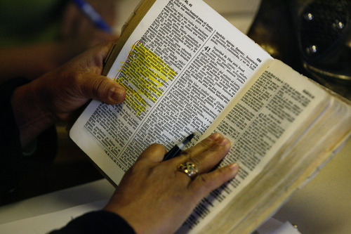 Scott Sommerdorf  |  The Salt Lake Tribune             
Silvia Bayani reads a passage from Romans during a meeting at The Vine Institute, Monday, Nov. 28, 2011. The Institute trains refugees to be Christian ministers either in their home countries or in refugee congregations in Utah, with a peer-learning approach.