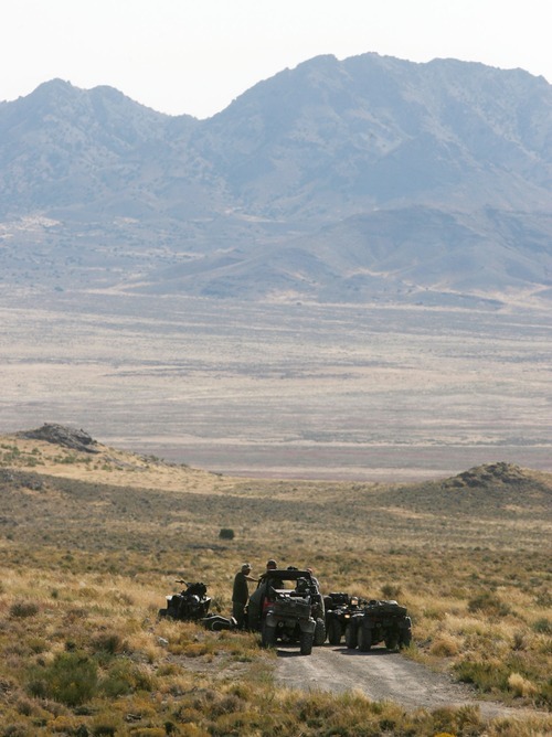 Steve Griffin  |  The Salt Lake Tribune
ATV searchers take a break continue the search for Susan Powell in the area around Topaz Mountain in Juab County about 40 miles north west of Delta, Utah, Sept. 15, 2011.