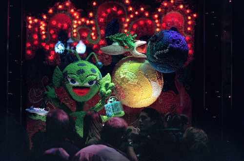 Tribune file photo
Holiday widow displays at the ZCMI department store had a popular run for nearly 30 years, including this one from 1999 that depicts aliens made of jelly beans.