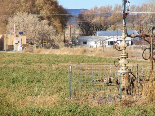 In this 2007 file photo, natural gas wellheads and other production facilities are shown around the rural community of Pavillion, Wyo.  The ranking Republican on the Senate Environment and Public Works Committee is asking the head of the U.S. Environmental Protection Agency for more information about an EPA investigation into groundwater contamination in a Wyoming gas field. Oklahoma Sen. James Inhofe asked EPA Administrator Lisa Jackson in a letter Tuesday to explain a recent comment she made about the contamination in the Pavillion area in central Wyoming. Jackson told a Bloomberg news program last month that a petroleum industry practice called hydraulic fracturing could have affected nearby areas containing groundwater.   (AP Photo/ Casper Star-Tribune, Dustin Bleizeffer)