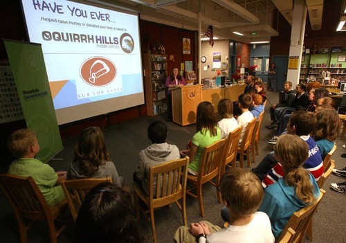 Steve Griffin  |  The Salt Lake Tribune
Oquirrh Hills Middle School seventh-graders in Natalie Allsop's technology class listen to Allsop talk about Generation Safe, a program that provides students and educators with the tools to navigate the digital world safely. Utah is the first to launch a statewide K-12 effort to teach students and educators about cybersafety. The event was held in the media center at the Riverton school Thursday,.