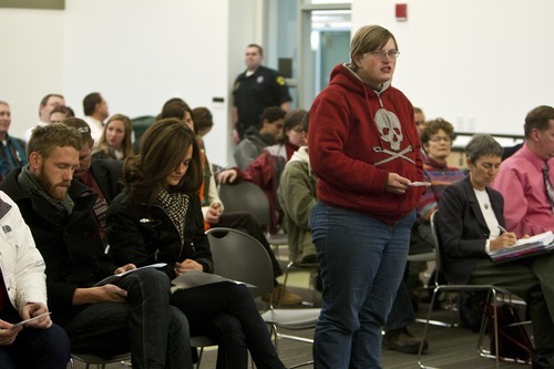 Chris Detrick  |  The Salt Lake Tribune
Isaac Hoppe leads members of Occupy SLC and Peaceful Uprising in voicing their concerns during the state's Air Quality Board meeting at the Multi-Agency Building on Wednesday.