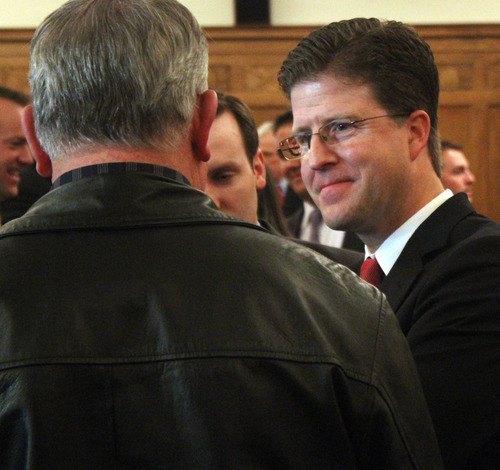 Rick Egan  | The Salt Lake Tribune 

David B. Barlow visits with friends and relatives after his investiture ceremony as a new U.S. Attorney, in Judge Benson's courtroom in the Frank E. Moss U.S. Courthouse, Friday, December 9, 2011.